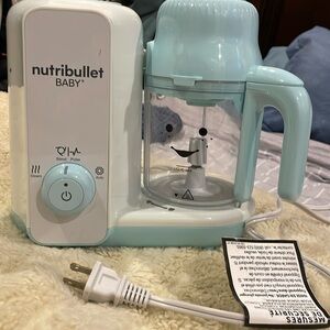 This is a BABY Nutribullet NEVER USED, BUT out of box